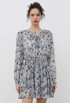 Gestuftes Skaterkleid mit Blumenmuster und Bindekragen in Schwarz